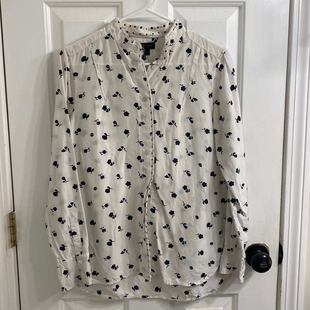 Coach skeleton and flower blouse